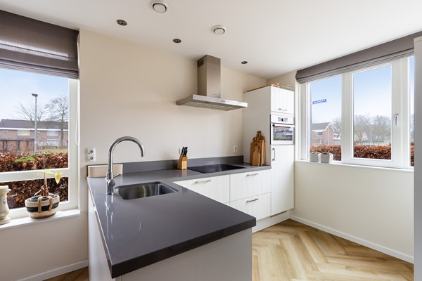 Foto - Te koop: Duurzame hoekwoning in kindvriendelijke wijk!